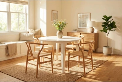 Modern Organic Round Dining Table Styled with Wishbone Chairs