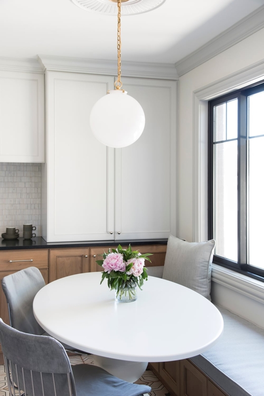 Modern Oval Breakfast Table with Pedestal Base for Banquette Seating.