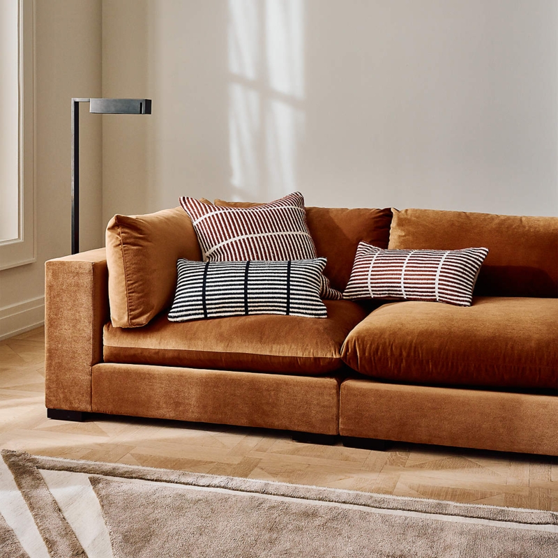 Modular Sectional Sofa in Copper Velvet with Striped Throw Pillows