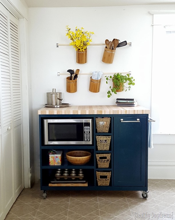 Navy Blue Kitchen Island with Butcher Block and Microwave Storage