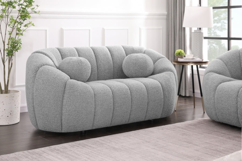 Off-White Loveseat featuring Wide Track Arms and a Boxy Silhouette