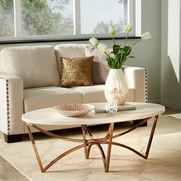 Oval Coffee Table with Champagne Finish and Architectural Base