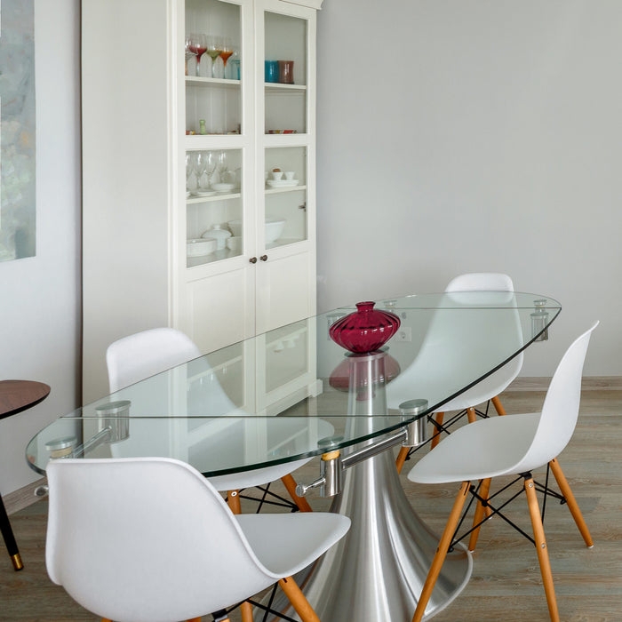 Oval Glass Dining Table with Polished Silver Pedestal Base