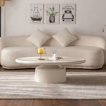 Oval Pedestal Coffee Table Matte Cream Finish Thick Profile Minimalist