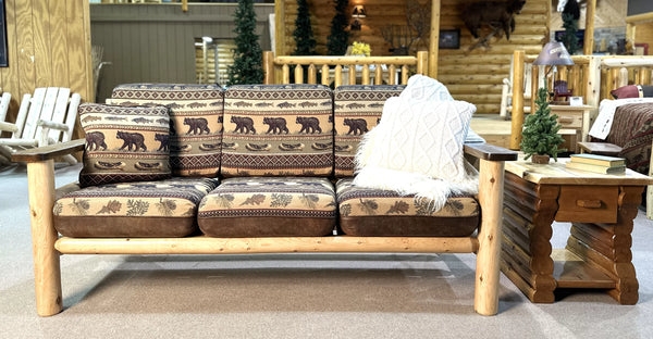 Paddle Arm Couch with Log Frame and Wildlife Motif Cushions