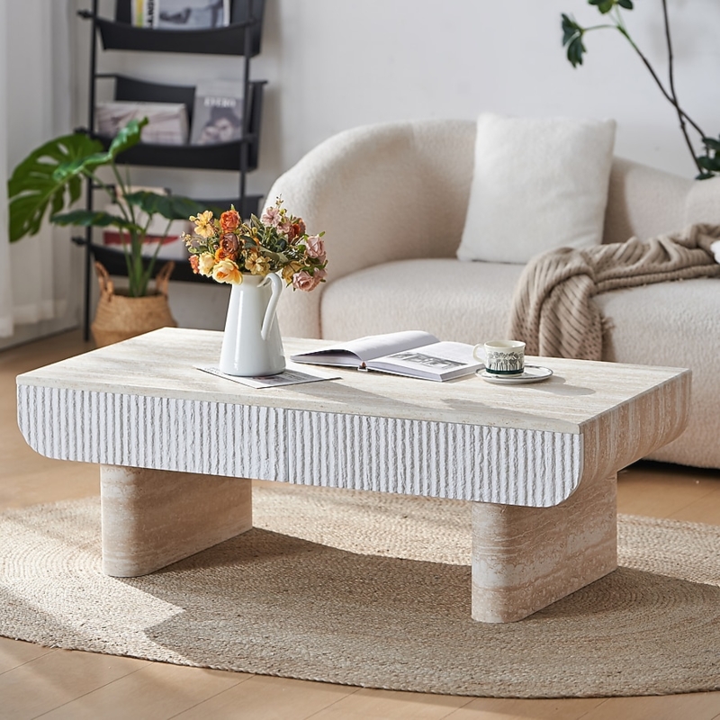 Pedestal Coffee Table with Faux Travertine Stone Look and Fluted Apron