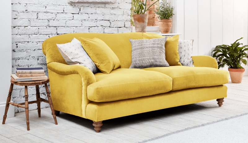 Primrose Upholstered Sofa with Curved Scroll Arms and Turned Wood Feet