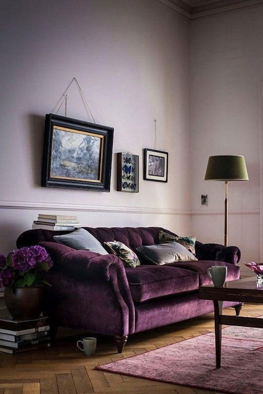 Purple Velvet Sofa in Moody Living Room with Herringbone Pattern Floor