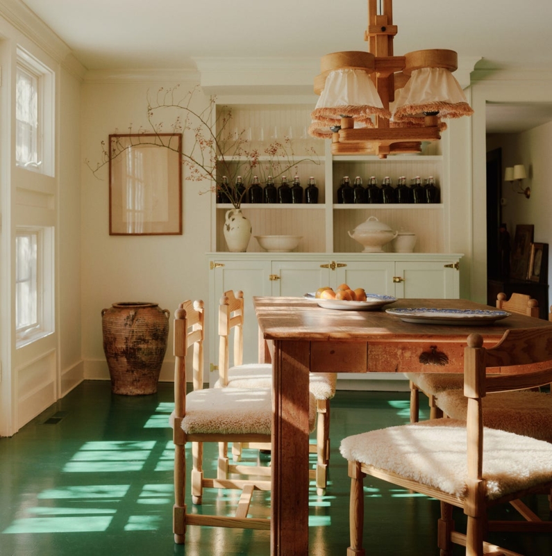 Refined Farmhouse Kitchen Dark Cabinetry Marble Island