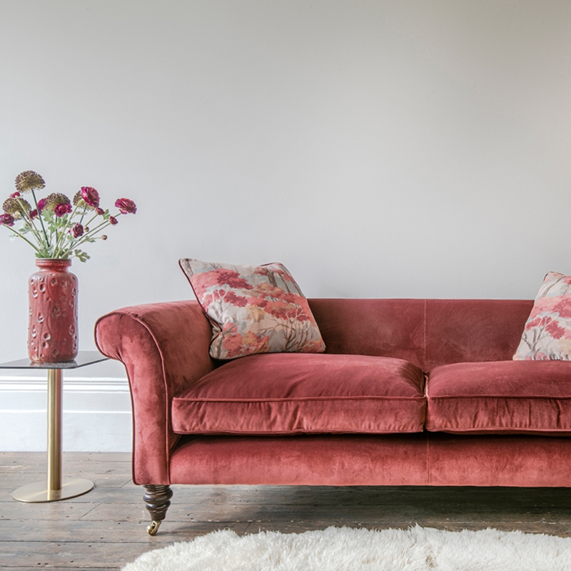 Rose Red Velvet Sofa with Vintage Casters and Rolled Arms