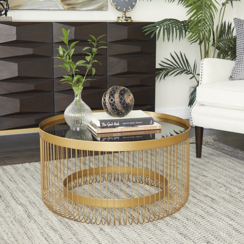Round Coffee Table featuring a Glass Top and Vertical Wire Cage Base