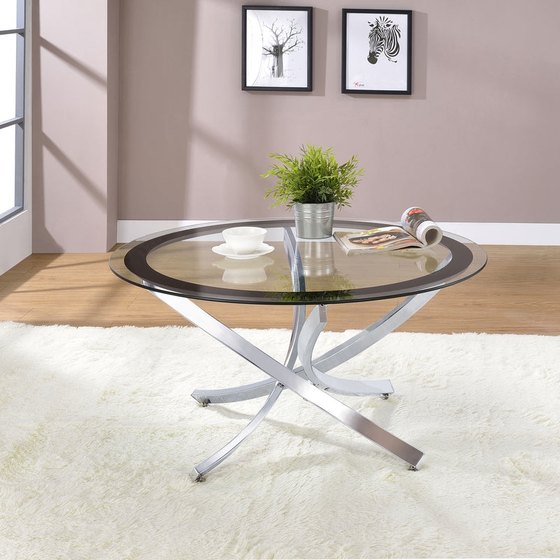 Round Coffee Table featuring Glass Top with Dark Border and Curved Base
