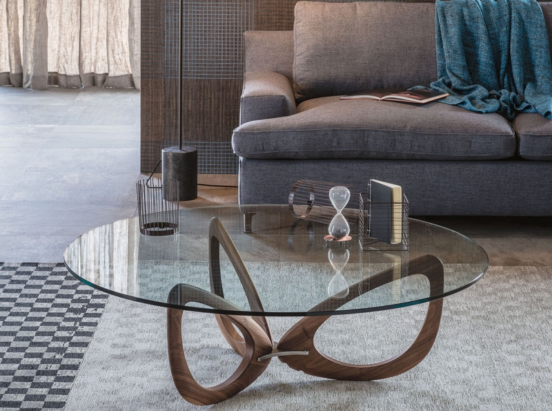 Round Coffee Table featuring Interlocking Wood-Toned Sculptural Base