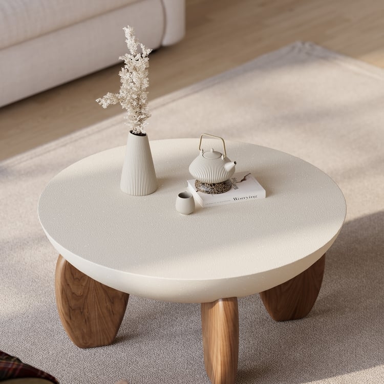 Round Coffee Table Pebbled Beige Surface Thick Walnut Legs