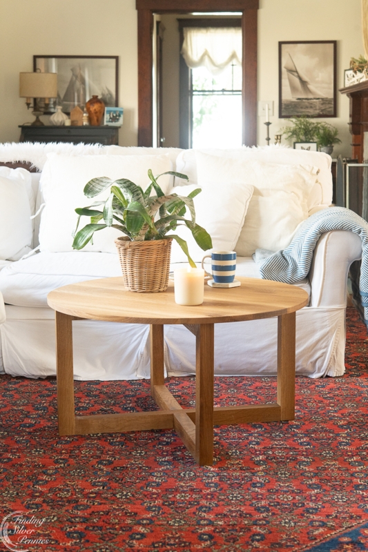 Round Coffee Table with Cross Base Design, Coastal Wood and Farmhouse Style
