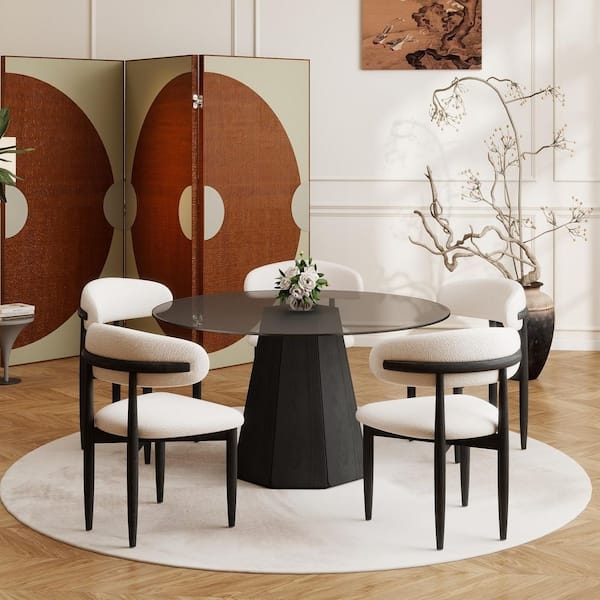 Round Dining Table: Smoked Glass Top, Black Faceted Base, Boucle Chairs