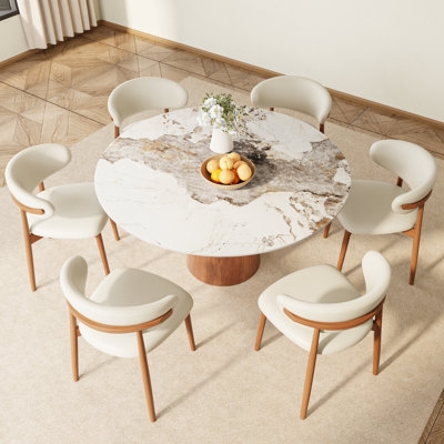 Round Marble Dining Set: Wood Toned Pedestal Base, Cream Curved Back Chairs