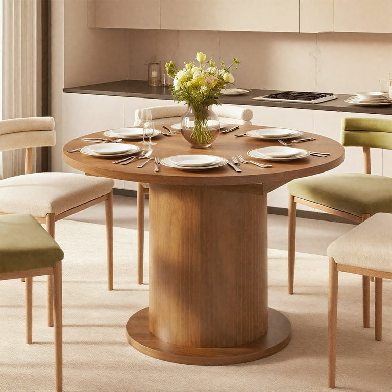 Round Pedestal Dining Table with Mixed Upholstery Chairs