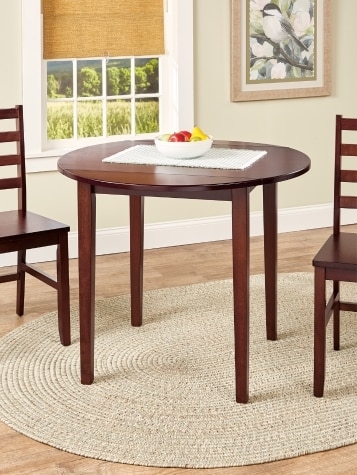 Round Walnut Dining Table with Tapered Legs for Small Spaces