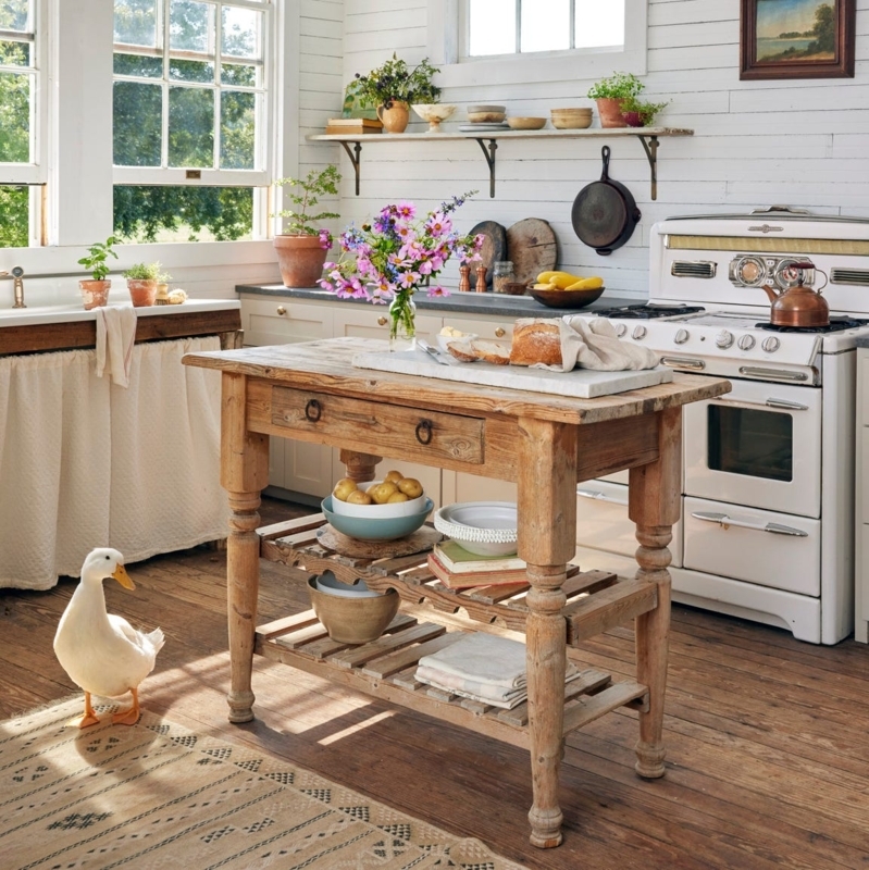 Rustic Farmhouse Kitchen Island with Distressed Wood and Turned Legs