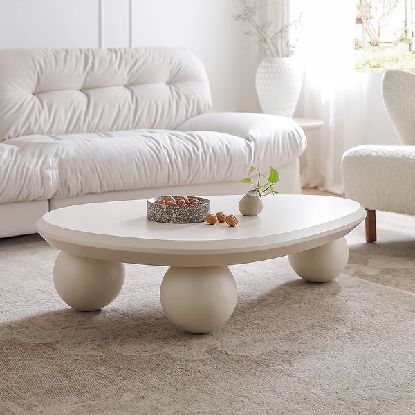 Sculptural Pill-Shaped Coffee Table with Three Large Ball Legs