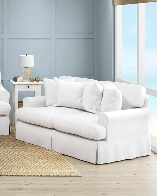 Slipcovered Loveseat with Skirted Base in Coastal Living Room Setting