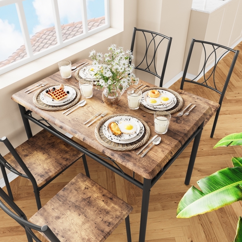 Small Space Dining Table Set featuring Arched Metal Back Chairs