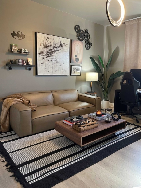Sofa Tan Leather-Like Bold Striped Rug Open Frame Table