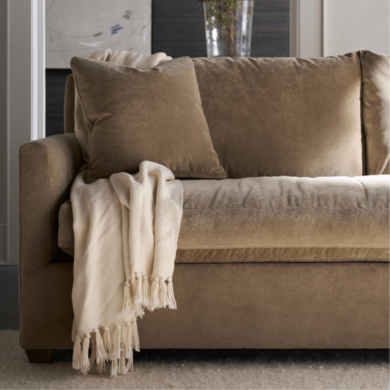 Taupe Velvet Sofa Styled with Fringed Throw & Pillows