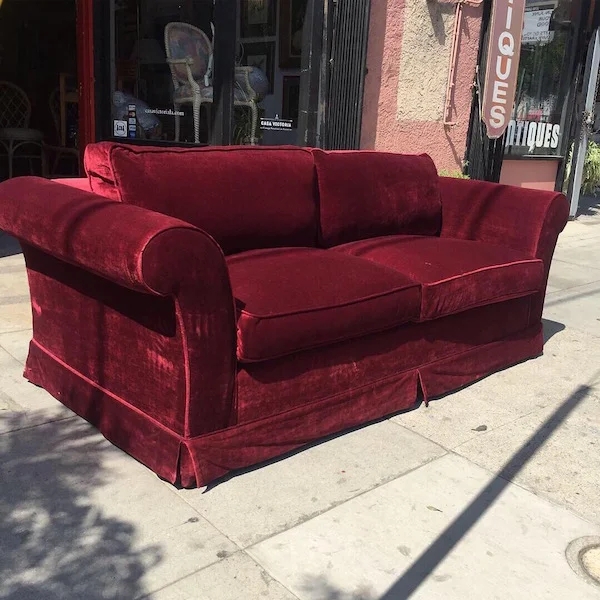 Traditional Two Cushion Sofa with Rolled Arms and Skirted Base