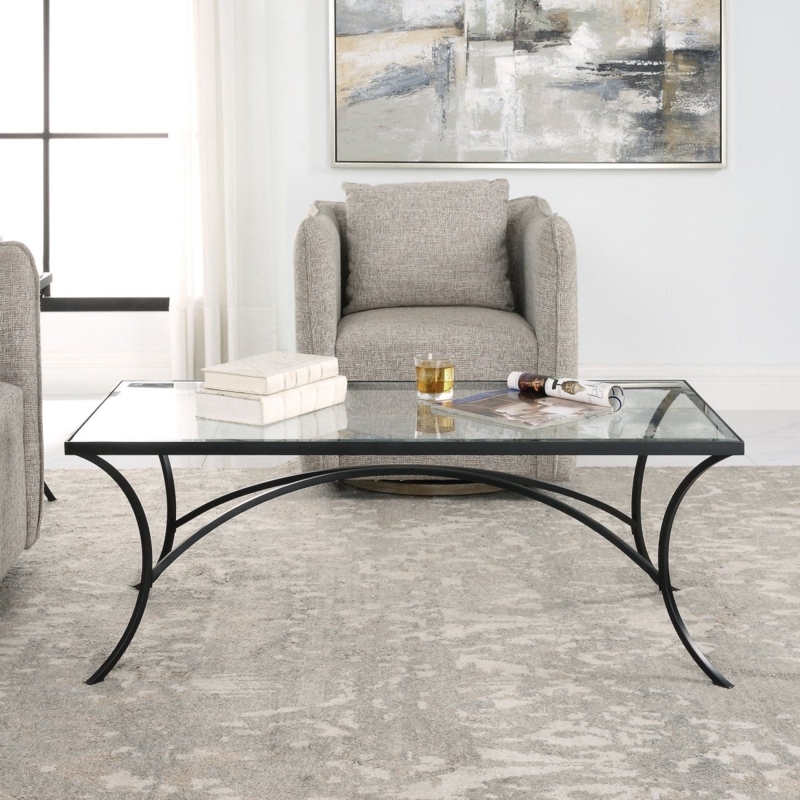 Transitional Glass Coffee Table featuring Distinctive Arched Metal Legs