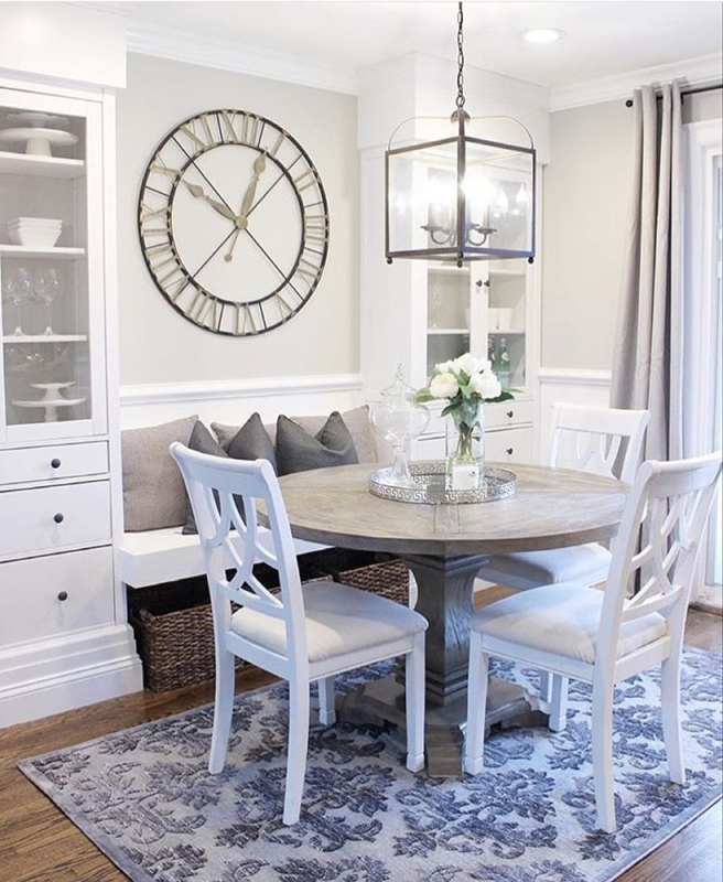 Weathered Wood Dining Table Set with White Geometric Back Chairs.