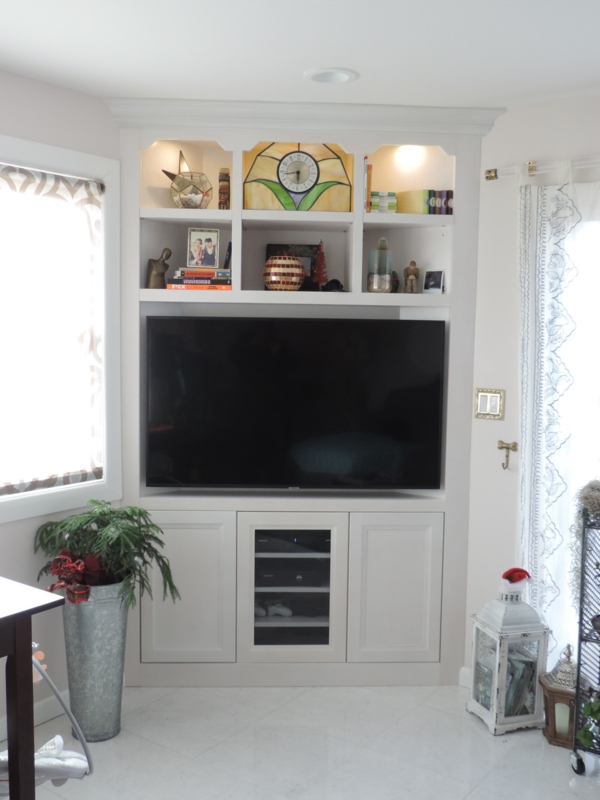 White Corner Entertainment Center with Built-In Lighting
