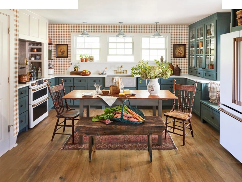 White Farmhouse Kitchen with Copper Accents and Stools
