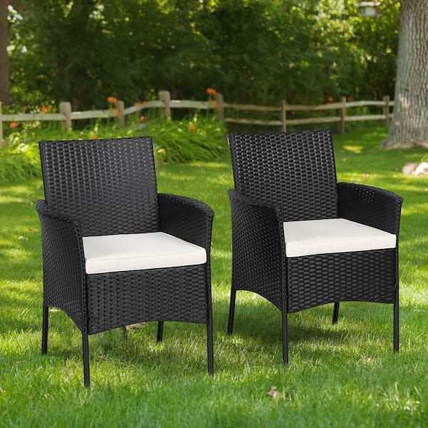 Woven Outdoor Armchairs with White Seat Cushions