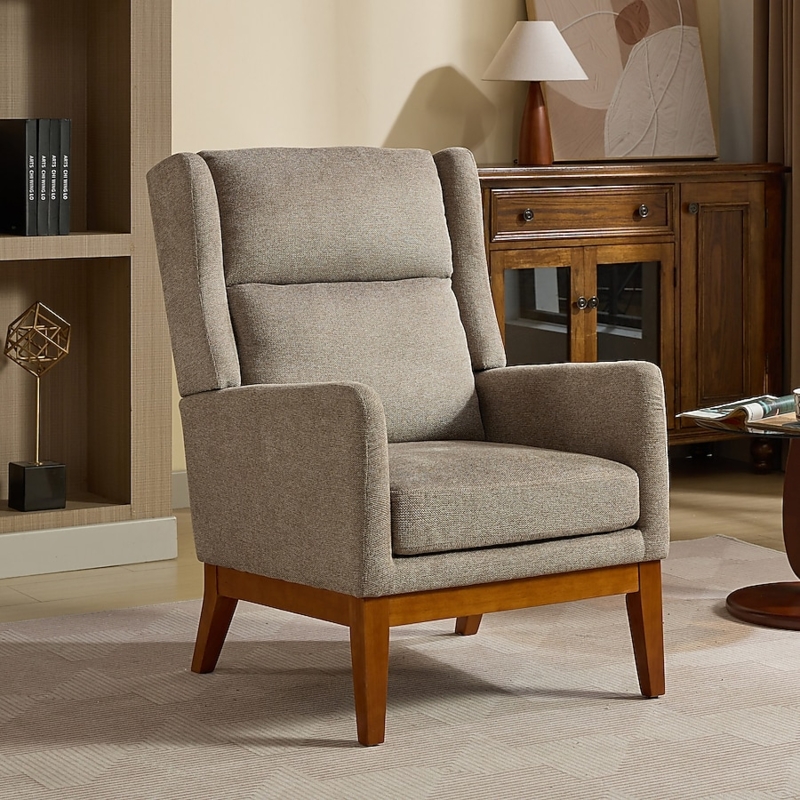 Accent Chair featuring Wingback Silhouette and Black Splayed Legs