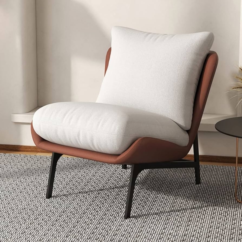 Accent Chair with Curved Silhouette and Slender Black Legs in Warm Tan