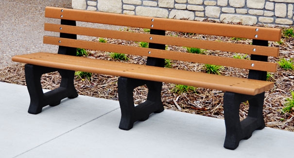 Black Outdoor Bench featuring Arched Side Frames and Slatted Seating