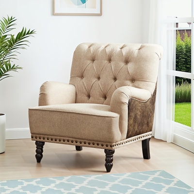 Classic Cream Wingback Chair with Button Tufting and Dark Legs