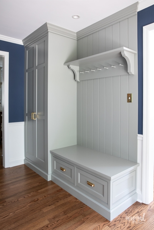 Gray Mudroom Built-In Cabinets with Vertical Beadboard and Coat Hooks
