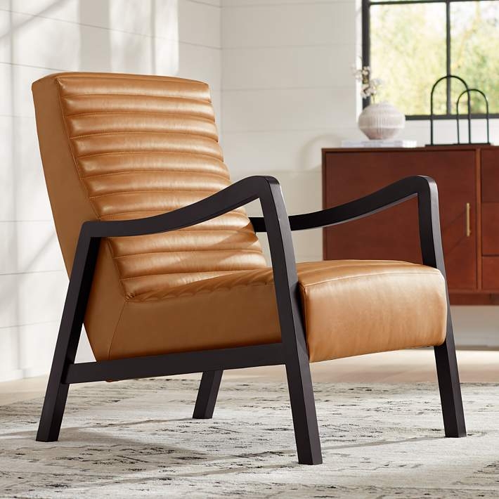 Minimalist Lounge Chair with Sling Seat Design and Black Metal Frame