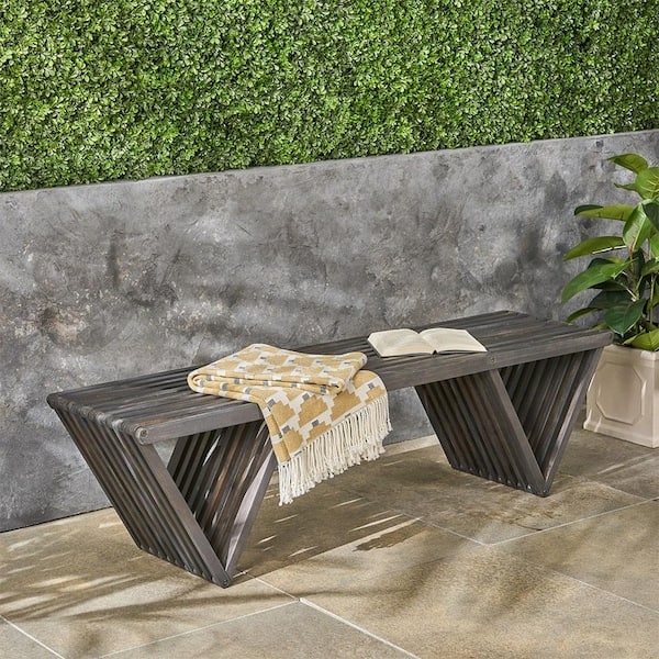 Modern Outdoor Bench featuring Unique Triangular Legs and Slatted Seat