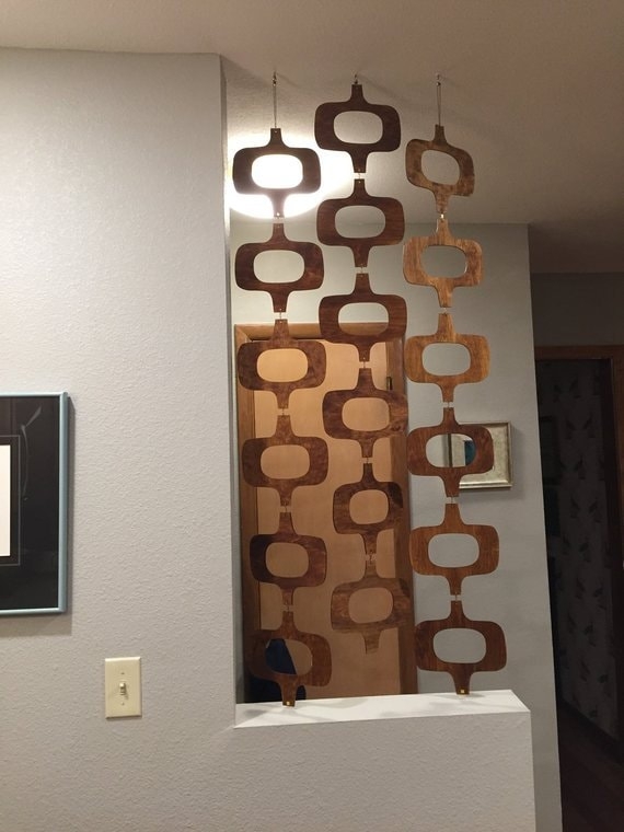 Modular Wood Panel Partition With Retro Geometric Cutouts