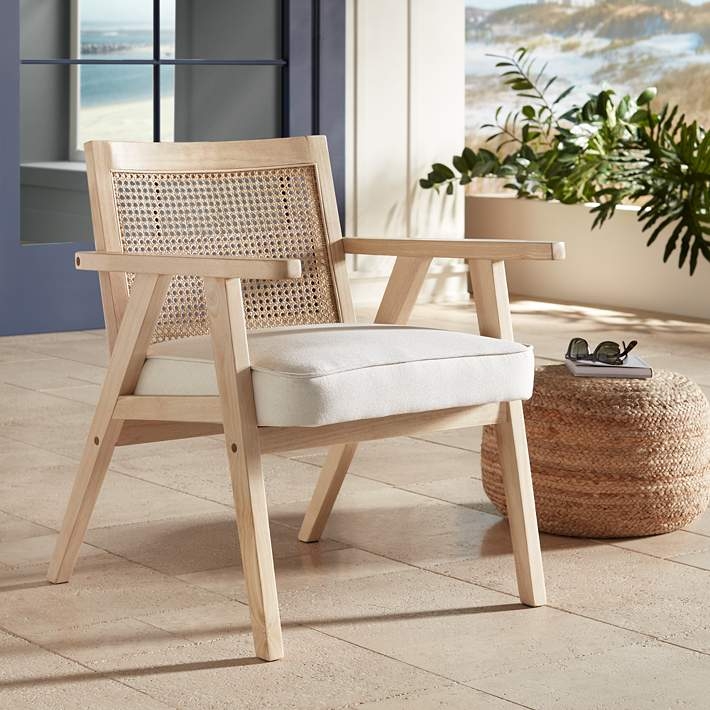 Organic Modern Accent Chair with Woven Rattan Back and Tapered Legs.
