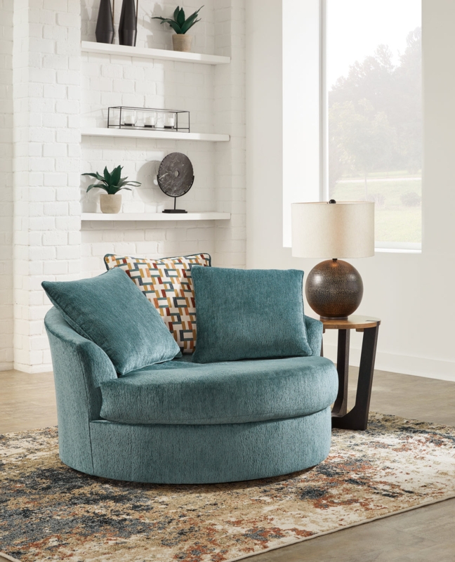 Teal Oversized Swivel Chair with Barrel Back and Lumbar Pillow