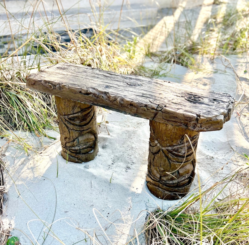 Tiki Style Garden Bench with Driftwood Texture and Carved Legs