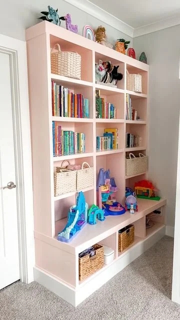 White Built-in Bookshelves with Bench, Coastal Style, and Navy Accents