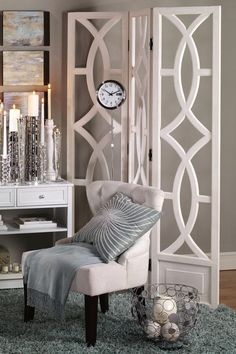 White Room Divider with Geometric Fretwork Pattern