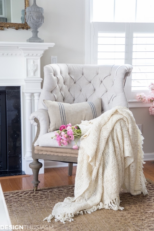 Whitewashed Medallion Back Accent Chairs in Living Room Setting