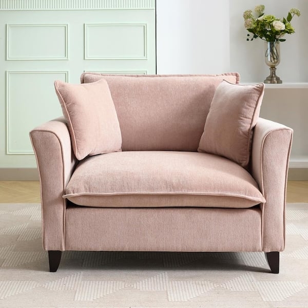 Wide Upholstered Accent Chair with Flared Arms and Pillows